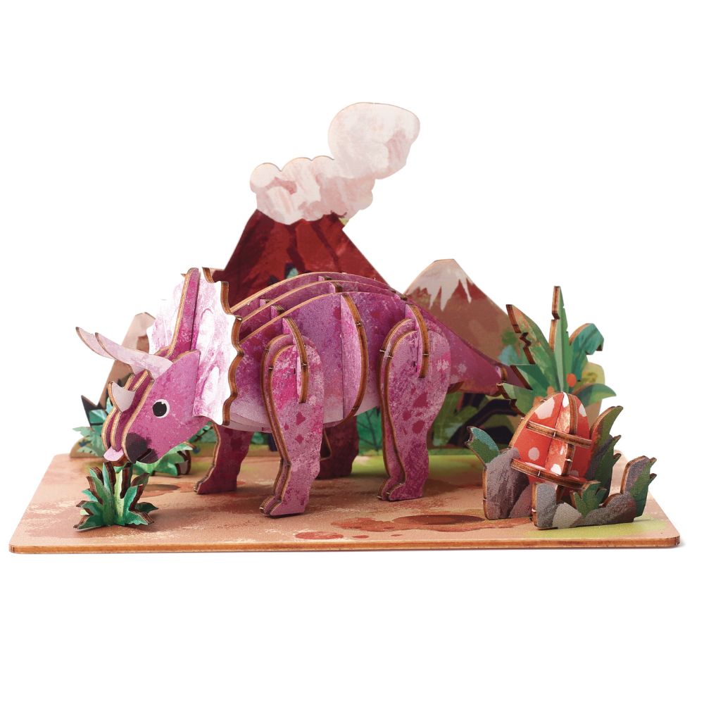 3D paper model of a dinosaur with a mountain and plant background