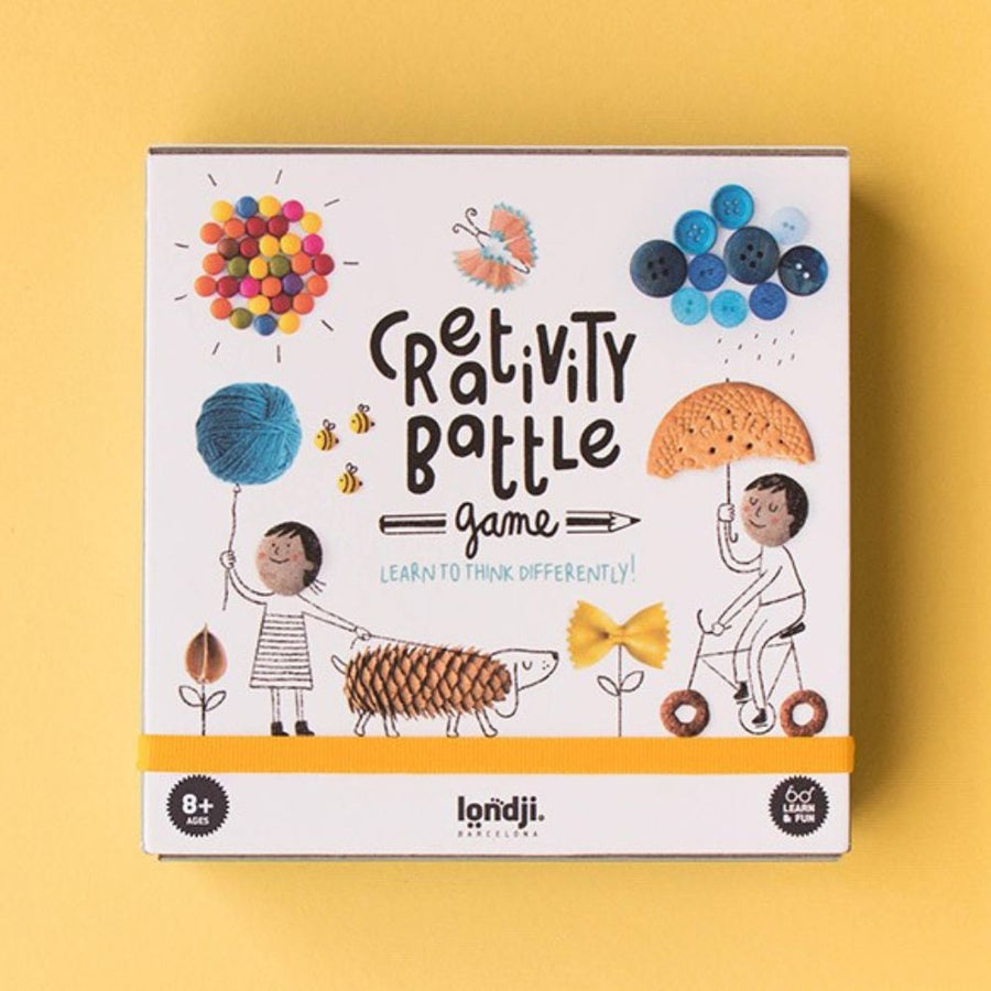 Kids playing a creative drawing storytelling card game by Londji